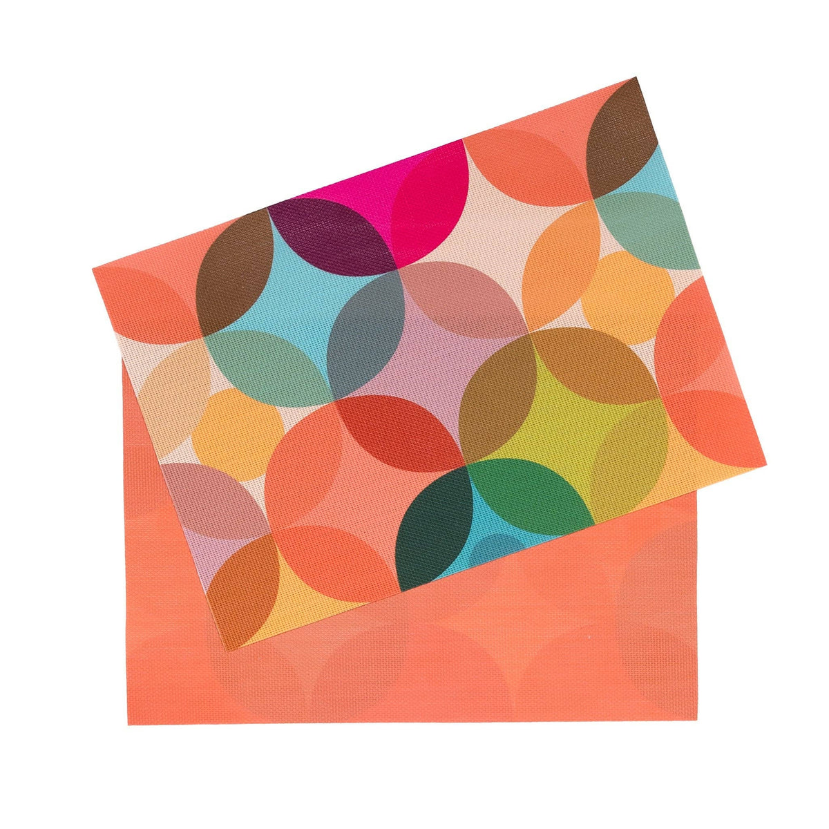 Colorful patterned paper with a geometric design on an orange background